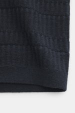 Close-up front view of textured knit navy Emporio Armani Short sleeve jumper in pure virgin wool with ribbed hem and logo stitching.

Description: 
<p>Versatile companion: This lightweight short sleeve jumper in pure virgin wool by EMPORIO ARMANI has a su