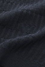 Close-up front view of the textured navy Emporio Armani Short sleeve jumper in pure virgin wool with logo stitching on the hem.

Description: 
<p>Versatile companion: This lightweight short sleeve jumper in pure virgin wool by EMPORIO ARMANI has a subtle 