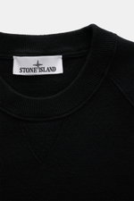 Close-up front view of the Stone Island Black crew neck sweater showing ribbed crew neckline and detailed knit pattern.

Description: <p>Warming comfort with iconic character: This STONE ISLAND sweater combines a high-quality wool blend with sporty style.