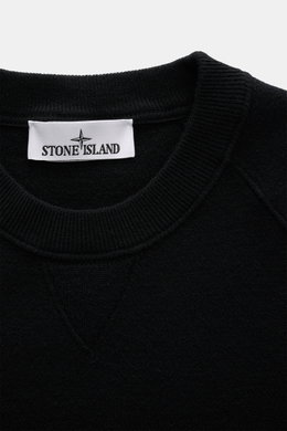 Close-up front view of the Stone Island Black crew neck sweater showing ribbed crew neckline and detailed knit pattern.

Description: <p>Warming comfort with iconic character: This STONE ISLAND sweater combines a high-quality wool blend with sporty style.