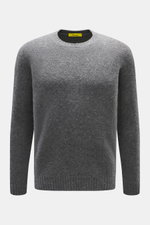 Front view of Drumohr Crew neck sweater navy in soft lambswool with fine knit pattern, ribbed cuffs, and regular fit.

Italian knitting craftsmanship at the highest level: DRUMOHR has always stood for exclusive knitwear. This crew neck sweater made of sof
