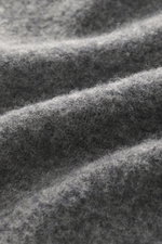 Close-up view of soft lambswool fabric showing fine knit pattern and texture from a detailed perspective, highlighting Drumohr Crew neck sweater navy.

Description: Italian knitting craftsmanship at the highest level: DRUMOHR has always stood for exclusiv