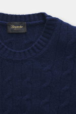 Close-up front view of Drumohr Cashmere crew neck sweater dark blue with classic cable knit, ribbed cuffs, slim fit, and ultra-soft pure cashmere.

Description: <p>Luxury you can feel: The crew neck sweater from DRUMOHR made of fine cashmere impresses wit