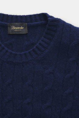 Close-up front view of Drumohr Cashmere crew neck sweater dark blue with classic cable knit, ribbed cuffs, slim fit, and ultra-soft pure cashmere.

Description: <p>Luxury you can feel: The crew neck sweater from DRUMOHR made of fine cashmere impresses wit