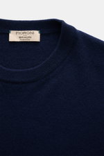 Close-up front view of Fioroni Cashmere Crewneck Sweater dark blue showing crew neckline, pure baby cashmere, very soft feel, fine knit pattern, slim fit, and flexible ribbed cuffs.
