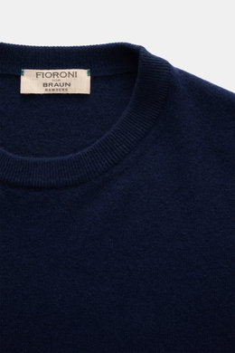 Close-up front view of Fioroni Cashmere Crewneck Sweater dark blue showing crew neckline, pure baby cashmere, very soft feel, fine knit pattern, slim fit, and flexible ribbed cuffs.