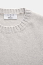 Gran Sasso Cashmere crew neck sweater light grey melange shown from above, featuring pure cashmere, very soft feel, fine knit pattern, regular fit, crew neckline, and comfortable ribbed cuffs.