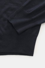Gran Sasso Fine-knit crew neck sweater navy shown from close-up top view, highlighting the regular fit, crew neckline, ribbed cuffs, very fine knit pattern, and lightweight, soft feel from a mix of virgin wool, cashmere, and silk.