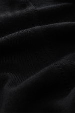 Gran Sasso Fine-knit crew neck sweater black shown in close-up from above, highlighting very fine knit, lightweight, soft feel, mix of virgin wool, cashmere, silk, regular fit, crew neckline, ribbed cuffs.
