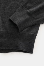 Gran Sasso Fine-knit crew neck sweater dark grey melange shown close-up from above, highlighting fine knit, ribbed cuffs, crew neckline, regular fit, mix of virgin wool, cashmere, and silk, very soft feel, lightweight quality.