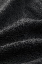 Gran Sasso Fine-knit crew neck sweater dark grey melange fabric close-up from above, showing very fine knit pattern, mix of virgin wool, cashmere, and silk, very soft feel, lightweight quality, regular fit, crew neckline, and comfortable ribbed cuffs.