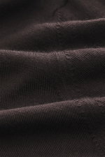 Gran Sasso Fine knit crew neck sweater dark brown shown in close-up from above, highlighting very fine knit pattern, mix of virgin wool, cashmere, and silk, very soft touch, lightweight quality, regular fit, crew neckline, and comfortable ribbed cuffs.