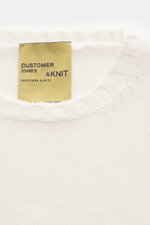 Close-up front view of B.F. Knitwear Merino crew neck jumper off-white showing rib knit bands, pure merino wool, soft feel, semi chunky knit, slim fit, crew neck.