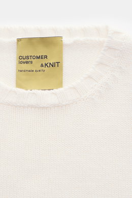 Close-up front view of B.F. Knitwear Merino crew neck jumper off-white showing rib knit bands, pure merino wool, soft feel, semi chunky knit, slim fit, crew neck.