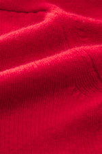 Close-up front view of B.F. Knitwear Cashmere crew neck sweater red showing medium-fine knit pattern and soft texture.

Description:  
<p>Autumnal cashmere from the knitting expert B.F. KNITWEAR: This softly knitted crew neck sweater is the perfect additi