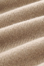 Close-up front view of B.F. Knitwear Cashmere crew neck beige showing medium-fine knit pattern and soft texture.