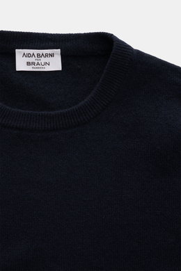 Close-up front top view of the Aida Barni Cashmere crew neck jumper navy showing crew neckline, fine knit pattern, and ribbed cuffs.  

Description:  
<p>Luxury-class essential: The Italian label AIDA BARNI processes premium cashmere in this timeless crew