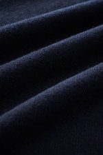 Close-up front view of navy fabric showing fine knit pattern and soft texture of Aida Barni Cashmere crew neck jumper navy.