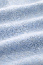 Close-up front view of the Aida Barni Cashmere crew neck jumper light blue melange showing fine knit pattern and soft texture.

<p>Luxury-class essential: The Italian label AIDA BARNI processes premium cashmere in this timeless crewneck sweater with a reg