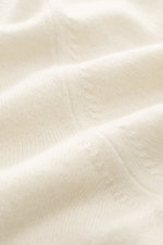 Close-up front view of Aida Barni Cashmere crew neck jumper cream showing fine knit pattern and soft texture, luxury pure cashmere.

Description: <p>Luxury-class essential: The Italian label AIDA BARNI processes premium cashmere in this timeless crewneck 