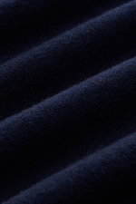 Close-up detail of finely knit navy fabric showing texture and smooth feel of the Brunello Cucinelli Cashmere pullover navy from a macro perspective.

Description: <p>This timeless and versatile finely knit crew neck sweater by BRUNELLO CUCINELLI is made 