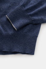 Close-up top view of Brunello Cucinelli Cashmere pullover grey blue melange sleeve cuff with narrow contrast edges, fine knit texture.

<p>This timeless and versatile finely knit crew neck sweater by BRUNELLO CUCINELLI is made from pure cashmere, featurin
