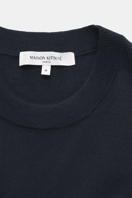 Close-up front top view of Maison Kitsuné Crewneck Sweater 'Red Profile' navy showing crew neckline and knit texture.

Description: <p>Cool essential by MAISON KITSUNÉ: With the typical fox stitching on the chest, this lightweight sweater made of pure woo