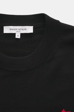 Maison Kitsuné Crewneck Sweater 'Red Profile' black shown from top front close-up, knit pure wool, soft feel, fine pattern, regular fit, crew neckline, fox stitching.

<p>Cool essential by MAISON KITSUNÉ: With the typical fox stitching on the chest, this 