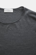 Close-up top-down view of the Kiefermann Merino fine knit sweater 'Benjaminn' dark grey melange showing round neckline, slim fit, pure merino wool, super soft feel, very fine knit pattern, and open, rolled edge finishes.