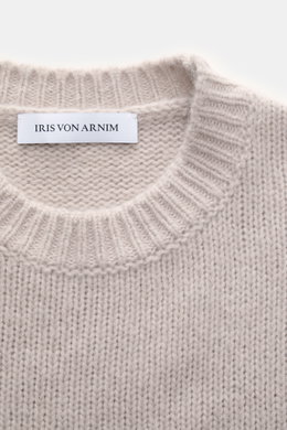 Close-up front view of Iris von Arnim Cashmere-silk crew neck sweater 'Felton' sand, showing mix of cashmere and silk, very soft feel, voluminous knit pattern, slim fit, crew neckline, and comfortable ribbed cuffs.