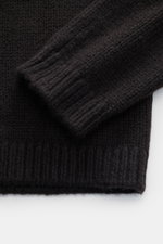 Iris von Arnim Cashmere-silk crew neck sweater 'Felton' dark brown shown in close-up from above, highlighting voluminous knit, slim fit, ribbed cuffs, crew neckline, very soft feel, mix of cashmere and silk.
