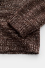 Close-up image of the Iris von Arnim Crewneck Sweater 'Felton' taupe/dark brown melange, showing the cuff and knit texture from a top-down perspective, featuring a mix of cashmere and silk, very soft feel, coarse knit pattern, regular fit, crew neckline, 