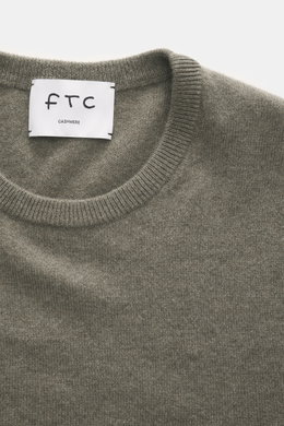 FTC Cashmere Crew Neck Sweater grey green shown from above, highlighting crew neckline, ribbed cuffs, pure cashmere, soft touch, fine knit, slim fit.