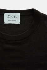 Close-up front view of the FTC Fine knit crew neck jumper dark brown, showing crew neck, ribbed bands, blend of cashmere and lyocell, OEKO-TEX® Standard 100 certified, very soft feel, very fine knit, and slim fit.