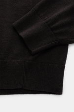 Close-up top-down view of FTC Fine knit crew neck jumper dark brown sleeve and hem, blend of cashmere and lyocell, OEKO-TEX® Standard 100 certified, very soft feel, very fine knit, slim fit, crew neck, comfortable ribbed bands.