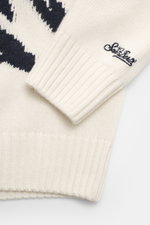 Close-up front view of MC2 Saint Barth Crew Neck Sweater 'Bombardino' cream/dark navy showing soft touch medium-fine knit, intarsia, ribbed cuffs, logo stitching on sleeve, crew neckline, slim fit, made of cashmere, wool, viscose, microfiber.