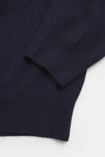 Close-up front-side view of MC2 Saint Barth Crew Neck Sweater 'Heron' navy/multicolor sleeve, showing soft touch mix of wool, viscose, cashmere, microfiber, medium-fine knit pattern, elaborate intarsia knitting, slim fit, crew neckline, sleeve ends with l
