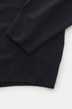 Close-up view of the sleeve and cuff of the B.F. Knitwear Merino Crew Neck Sweater navy, showing pure merino wool, soft feel, fine knit pattern, regular fit, crew neckline, and comfortable ribbed cuffs.