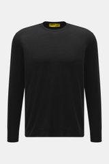 Front view of B.F. Knitwear Merino Crew Neck Sweater black, made of pure merino wool with a soft feel, fine knit pattern, regular fit, crew neckline, and comfortable ribbed cuffs.