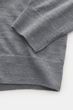 Close-up front view of B.F. Knitwear Merino Crew Neck Sweater grey melange, showing pure merino wool fabric with soft feel, fine knit pattern, regular fit, crew neckline, and comfortable ribbed cuffs.