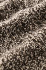 Agnona Crew neck sweater taupe/dark brown melange shown in close-up from above, revealing medium-coarse knit pattern and soft wool-cashmere blend fabric. Timeless elegance for autumn and winter: The crew neck sweater from the Italian label AGNONA presents