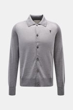 Front view of Ami Paris Merino cardigan grey mottled with knit collar, six-button placket, raglan sleeves, and logo stitching on chest.

<p>Timelessly elegant: The AMI PARIS cardigan, with its knit turn-down collar and pure merino wool fabric, is a comfor