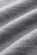 Alt tag (125 characters): Close-up front view of Ami Paris Merino cardigan grey mottled fabric, showing fine knit texture and soft merino wool.

Additional description:
<p>Timelessly elegant: The AMI PARIS cardigan, with its knit turn-down collar and pure