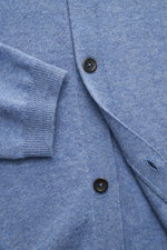 Close-up front view of von Braun Cashmere knit shirt blue mottled in fine Mongolian cashmere, showing soft ribbed cuffs, slim fit, smooth button placket, and classic collar.

Description:  
Luxurious winter essential: This VON BRAUN knit shirt in the fine