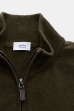 Close-up front view of the von Braun Cashmere half-zip jumper olive, showing its fine knit, slim fit, and signature zip detail. <p>This clean VON BRAUN half-zip jumper made from high-quality and exceptionally fine Mongolian cashmere combines a timeless de
