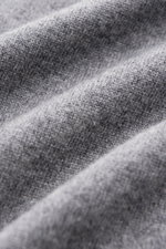 Close-up angled view of the fine knit texture of the von Braun Cashmere half-zip jumper grey mottled, showcasing its soft, pure cashmere fabric.

<p>This clean VON BRAUN half-zip jumper made from high-quality and exceptionally fine Mongolian cashmere comb