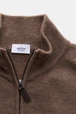 Close-up front view of the von Braun Cashmere half-zip jumper brown mottled, showing fine knit, ribbed collar, and half-zip with leather pull. <p>This clean VON BRAUN half-zip jumper made from high-quality and exceptionally fine Mongolian cashmere combine