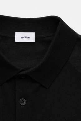 Close-up front view of von Braun Merino fine knit polo black with narrow collar, three-button placket, and smooth fine knit texture.

Description: <p>Pure Merino wool in a comfortable fine knit makes this knit polo from the brand VON BRAUN a luxurious ess
