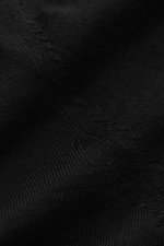 Close-up front view of the von Braun Merino fine knit polo black, showing its pure merino wool texture and fine knit fabric.

<p>Pure Merino wool in a comfortable fine knit makes this knit polo from the brand VON BRAUN a luxurious essential in a particula