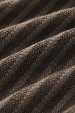 Close-up front view of the Emporio Armani Quarter-zip jumper brown/dark brown striped showing pure new wool, soft feel, fine knit pattern, knit pattern in striped look, regular fit, stand up zip-collar, and comfortable ribbed cuffs.